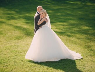 blonde bride with her groom